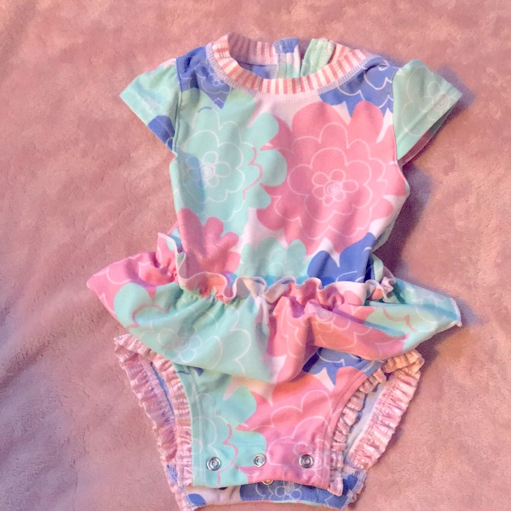 Ruffle Butts pastel petals peplum swimsuit
